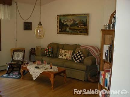 Living Room
						:
						Open concept w/ DR. Has vaulted Greatroom features. Beautiful beam exposed.