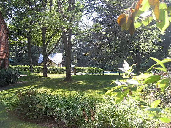 Yard looks to pool area