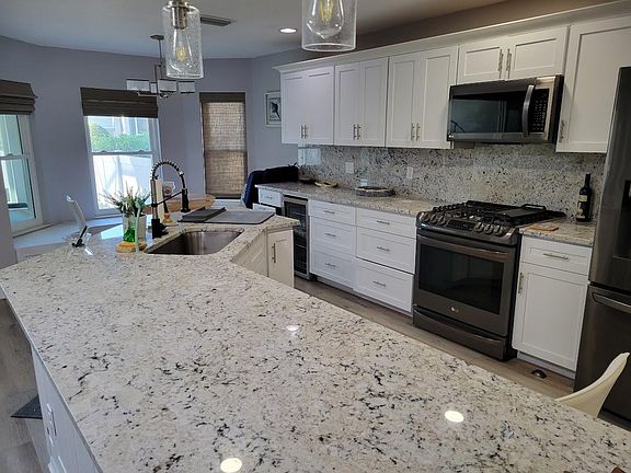 View of kitchen looking towards lanai