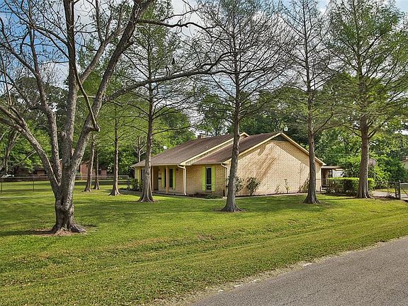 Approx. 3/4 acre corner lot with 1,800+ sf home. Beautiful pecan, cypress and oak trees.