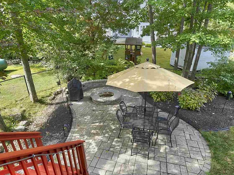 Patio with firepit. Professional landscaping.