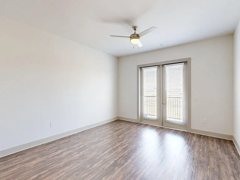 Apartment Living Room with Wood Style Floor and Patio/Balcony.