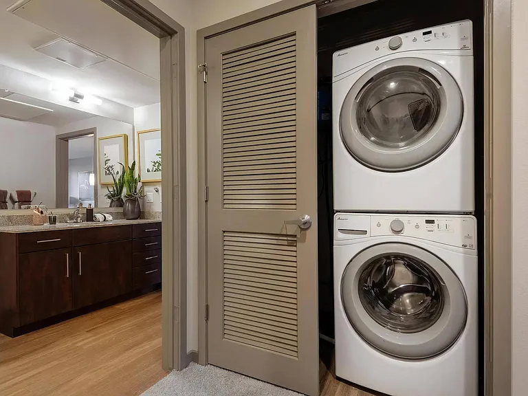Convenient In-Unit Washer and Dryer in Hallway Closet