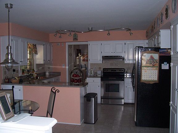 Open living area kitchen, eating nook and family room