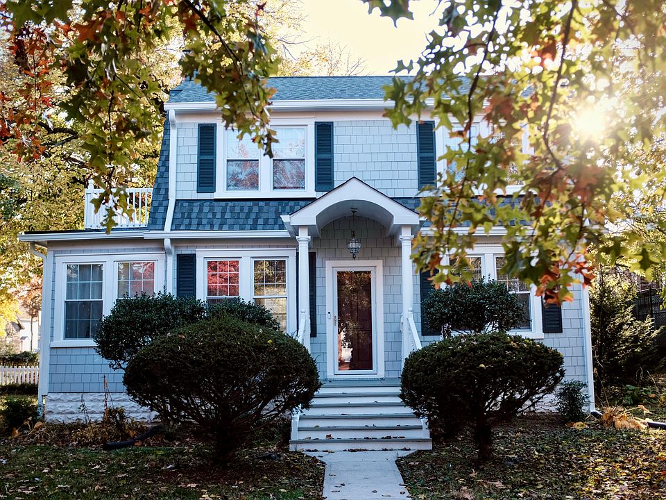 A favorite older photo of the home in the fall (before new landscaping)