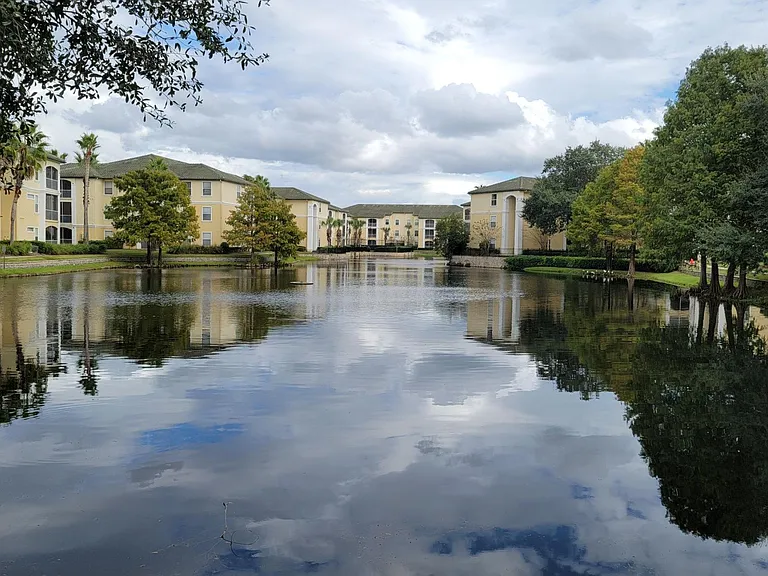 Lake view of back of the unit from club house. Units have been painted since this picture was taken