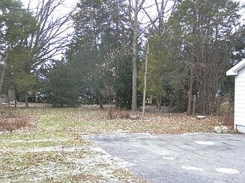 Semi wooded lot 222 ft deep