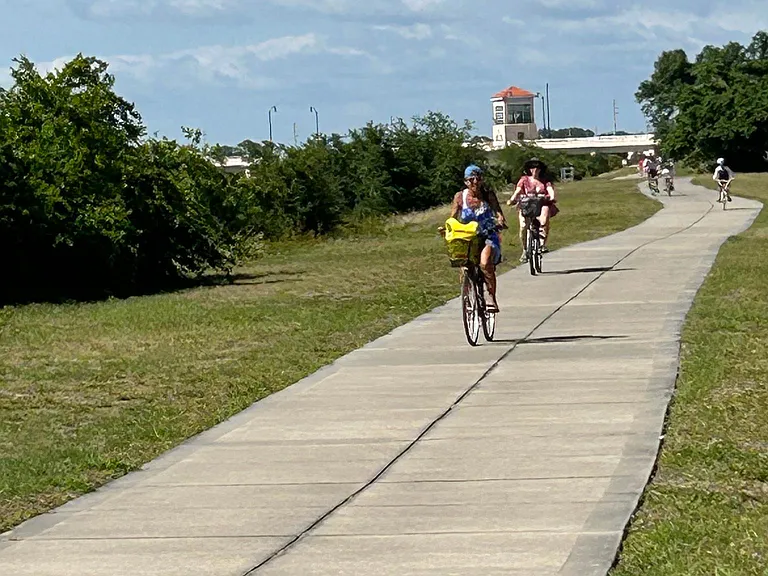 Bike peeps on Intracoastal bike path. Drawbridge in background. Minutes away.