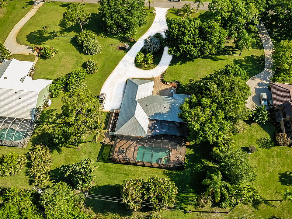 Lushly landscaped 1 acre.
