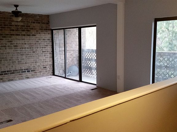 Master bedroom which features a deck and ample storage space