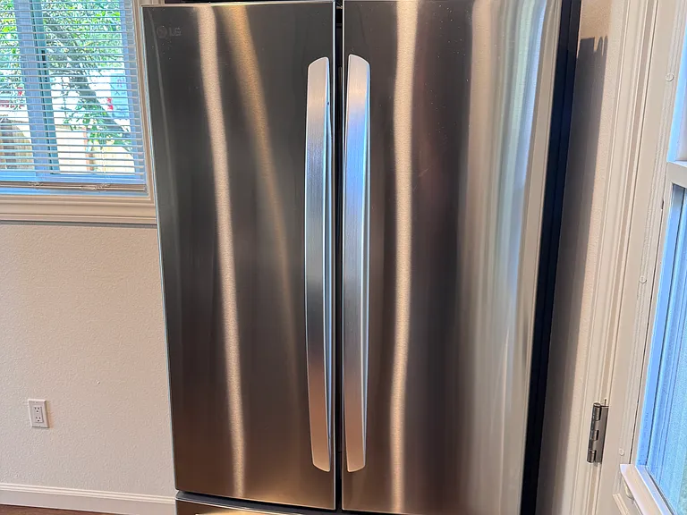 refrigerator with storage cabinets above
