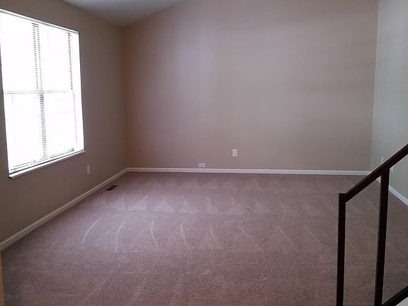 Living Room: new carpet; new paint; new blinds