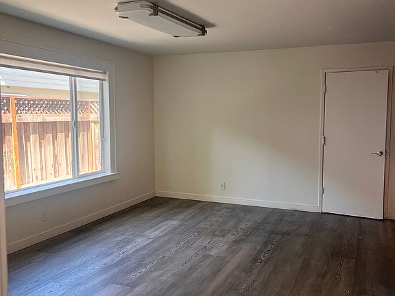 Living room is next to the dining room. Dining Room door leads to the garage