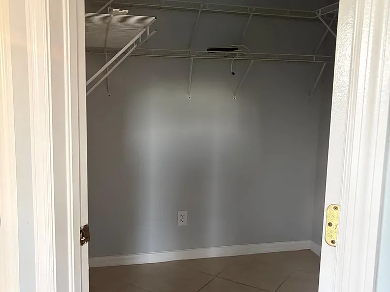 Walk in main bedroom closet