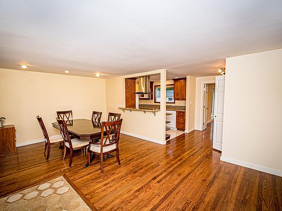 Dining Room with Kitchen in the back and large pantry on the right!