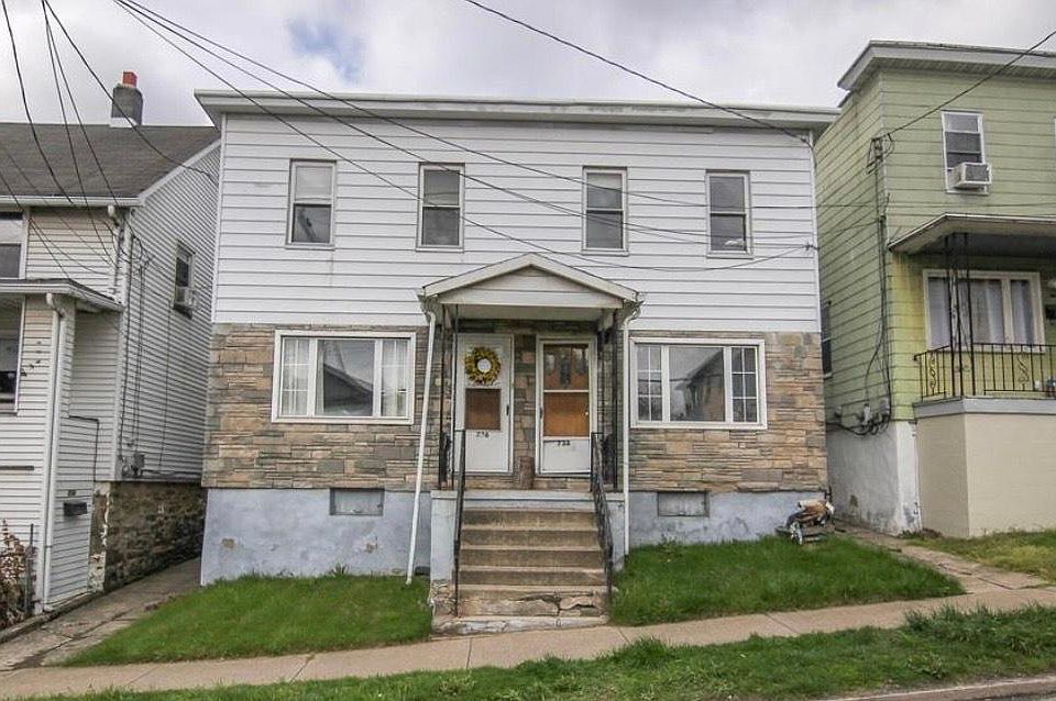 Front of house on the left side