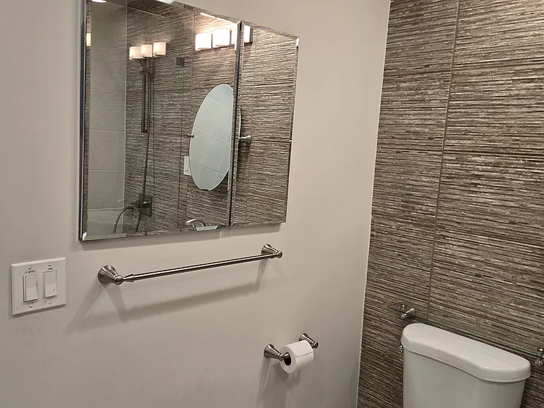 Bathroom showing the large Medicine Cabinet for personal storage all kinds of personal storage