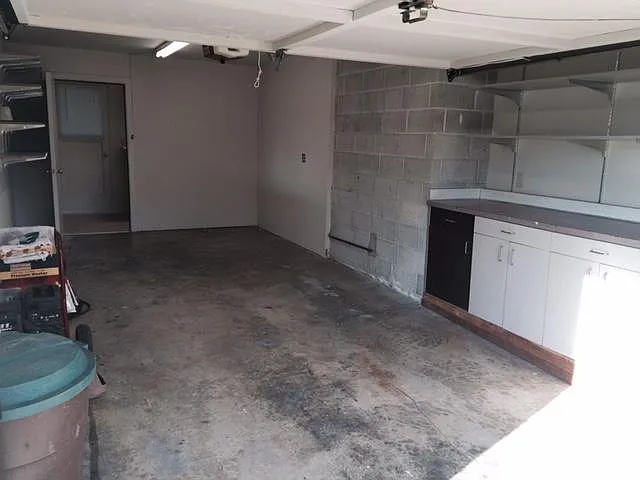 Large single garage with storage, carport