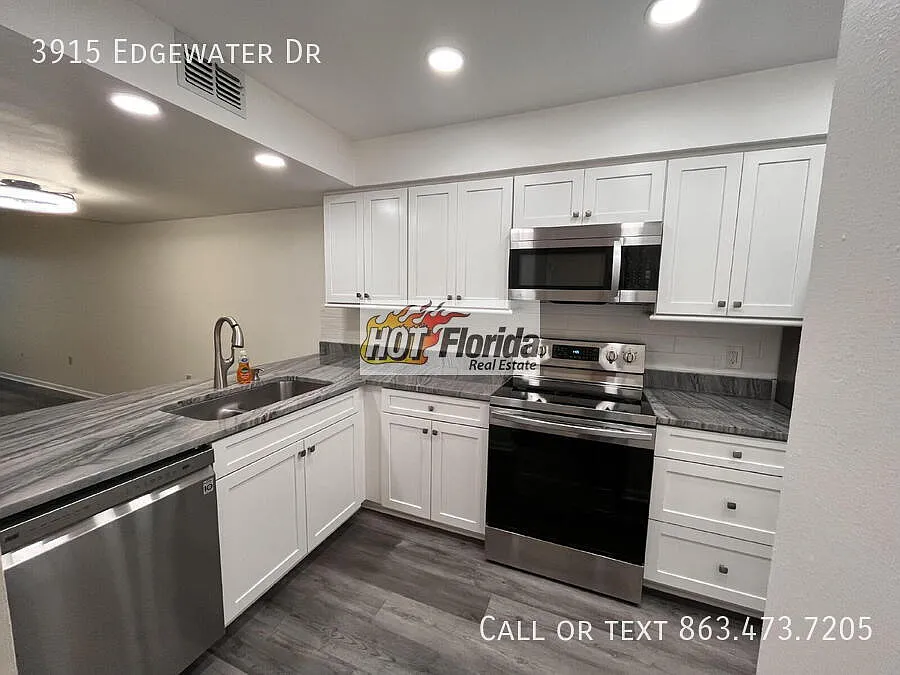 Two-story condominium, featuring 2 bedrooms and 2 1/2 bathrooms — Photo 4