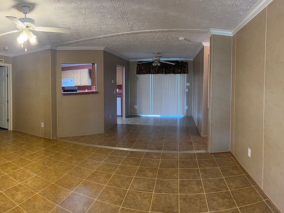 VIEW FROM FRONT DOOR
2 TWO BEDROOMS AND 
A BATH TO THE RIGHT AND 
MASTER BEDROOM AND 
BATH TO THE LEFT