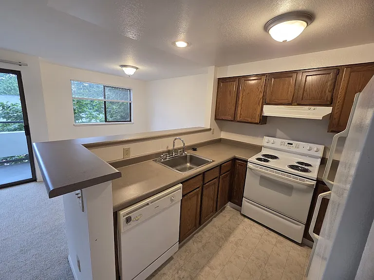 Kitchen, dish washer, stove, Refrigerator, wine storage rack