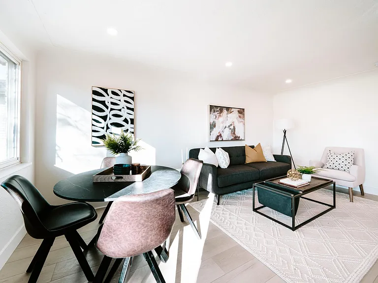 Upstairs front room with dining room