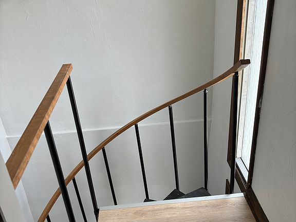 Front entrance, spiral staircase to third floor
