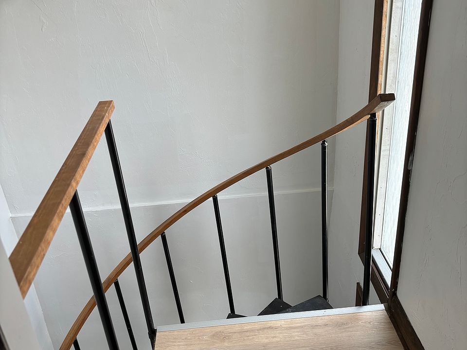 Front entrance, spiral staircase to third floor
