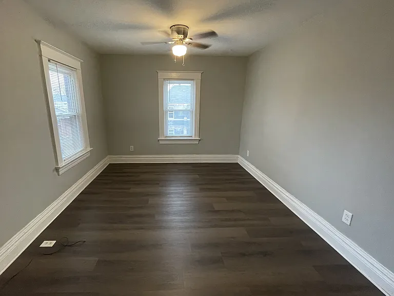 living room with ceiling fan