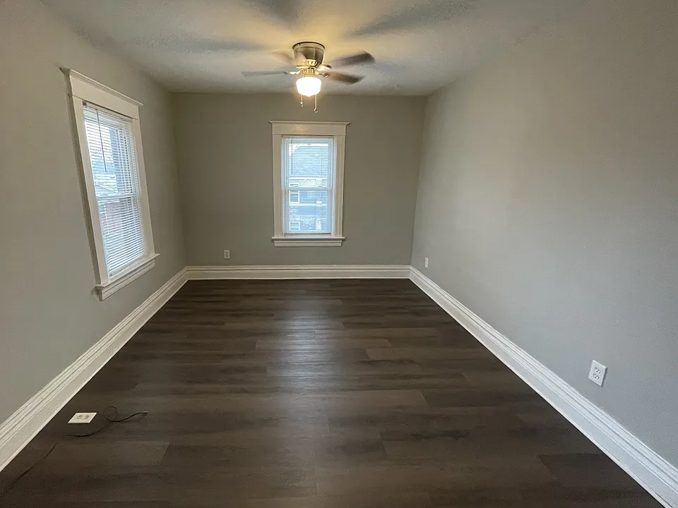 living room with ceiling fan