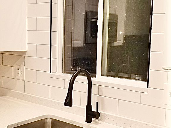 Lovely countertops, Spacious sink, dishwasher, garbage disposal