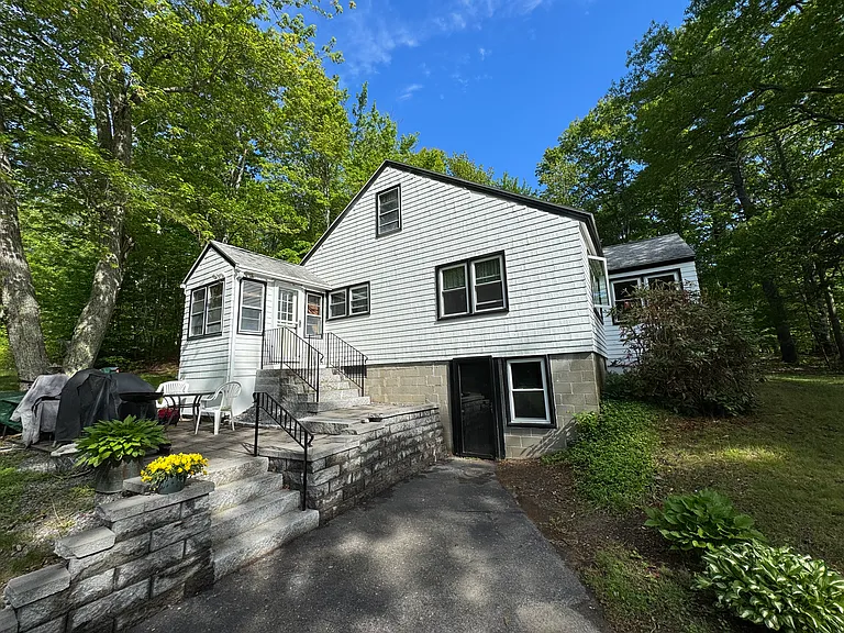 View from the driveway of the new stone steps and patio