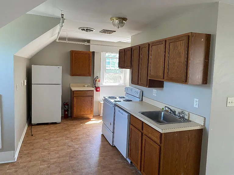 Updated Kitchen, comes with fridge, stove and dishwasher...also getting new flooring!