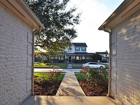 From entry looking across big front yards and wide street.