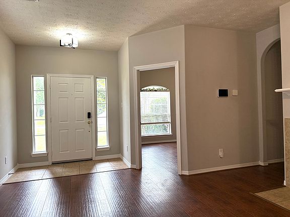 Front door in the living room. Office room, hallway to the right
