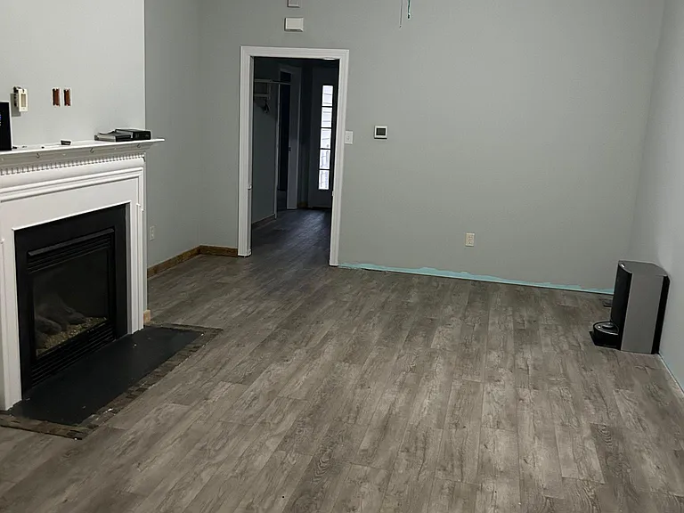 Cozy propane fireplace in living room.