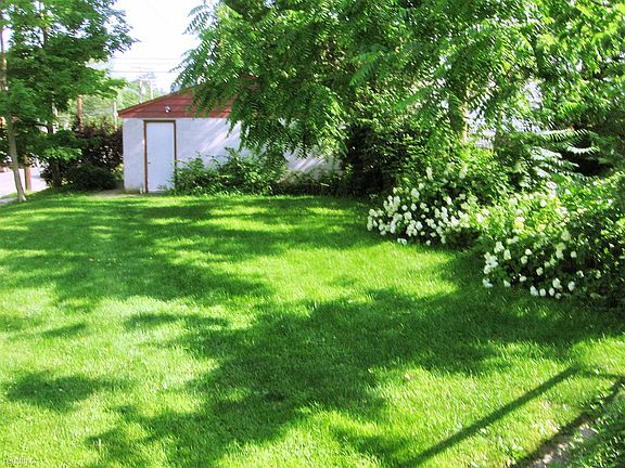 Back yard & 2 Car Garage
