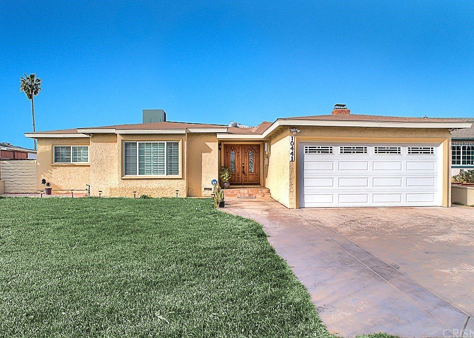 Handsome curb appeal with double door entry, a cem