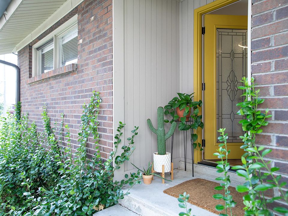 Apt #B's front porch (follow the concrete path from the front or back of the house to reach this entrance that is technically on the side of the property.)