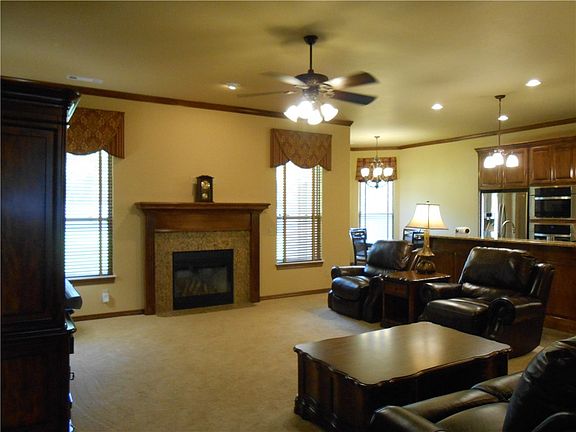 The living room is big enough for the family and open to the kitchen.