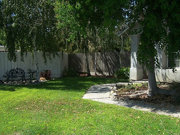Beautiful entrance with shade trees