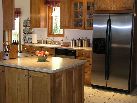 Remodeled eat in Kithcen with stainless steel appliances
