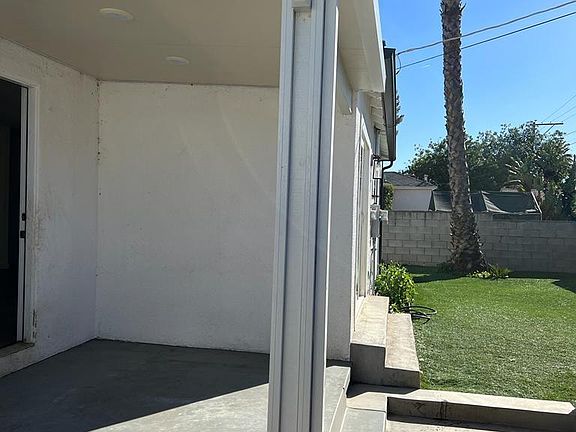 backyard with covered patio area