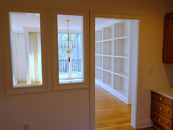 Kitchen looks out to dining area.