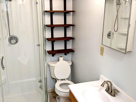 Freshly painted Bathroom - new lighting & shelving