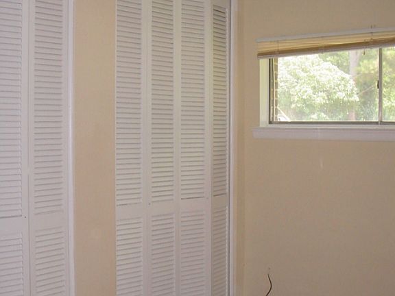 Partial view of one of the bedrooms.