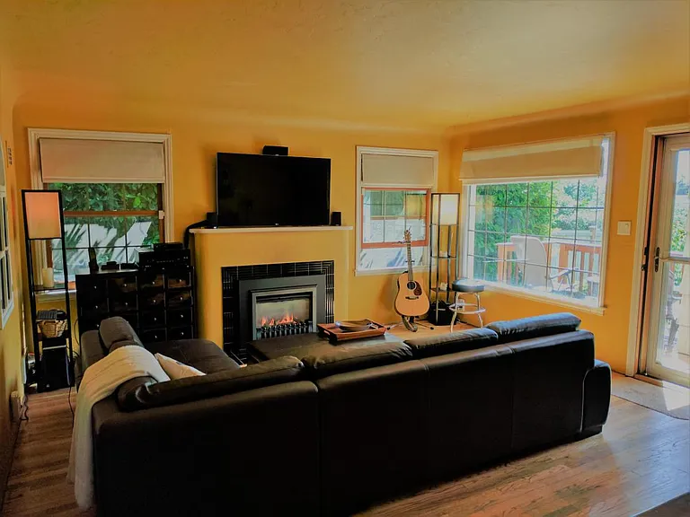Living Room: Gas fireplace with remote for both aesthetic an
