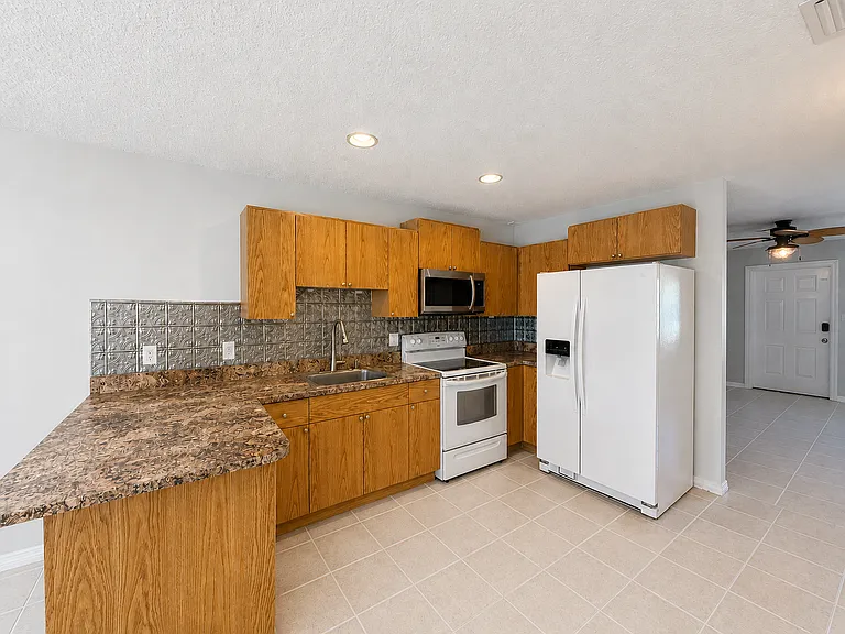 2478 NW Holiday Ct — Photo 19
