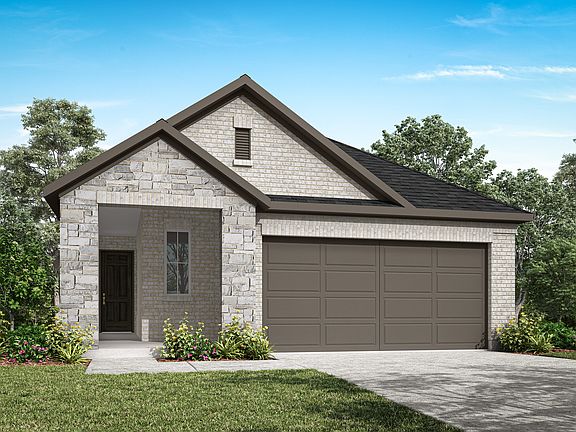 A two-story stone and wood-framed house with a garage door and a well-manicured lawn surrounded by l