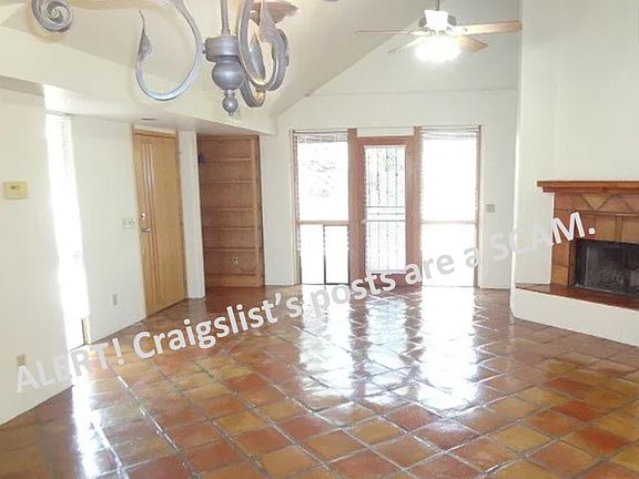 Spacious living room with lots of light.